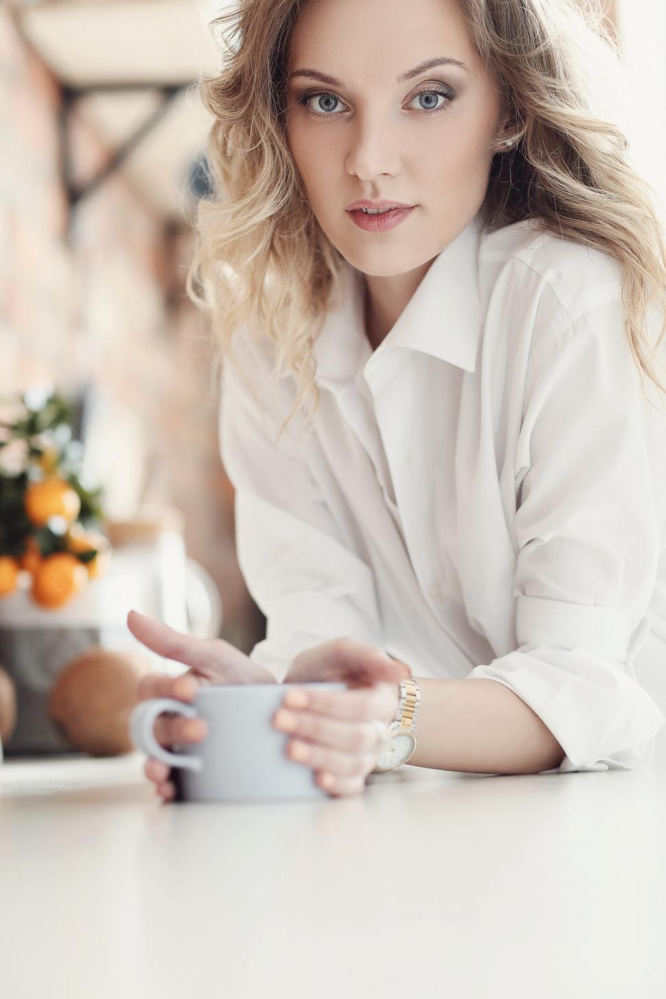 Free Image of Woman with warm beverage 