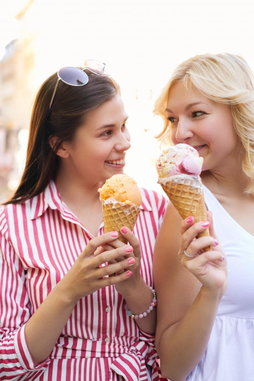 Free Image of Two Women with Ice Cream Cones 