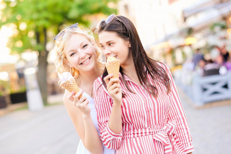 Free Image of Happy women together outside 