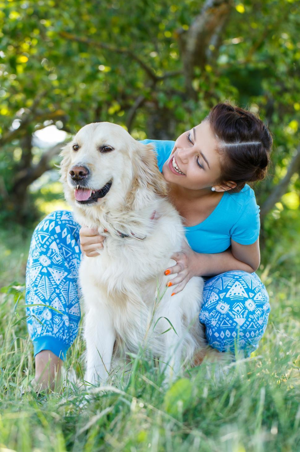 Free Image of Young woman with dog 