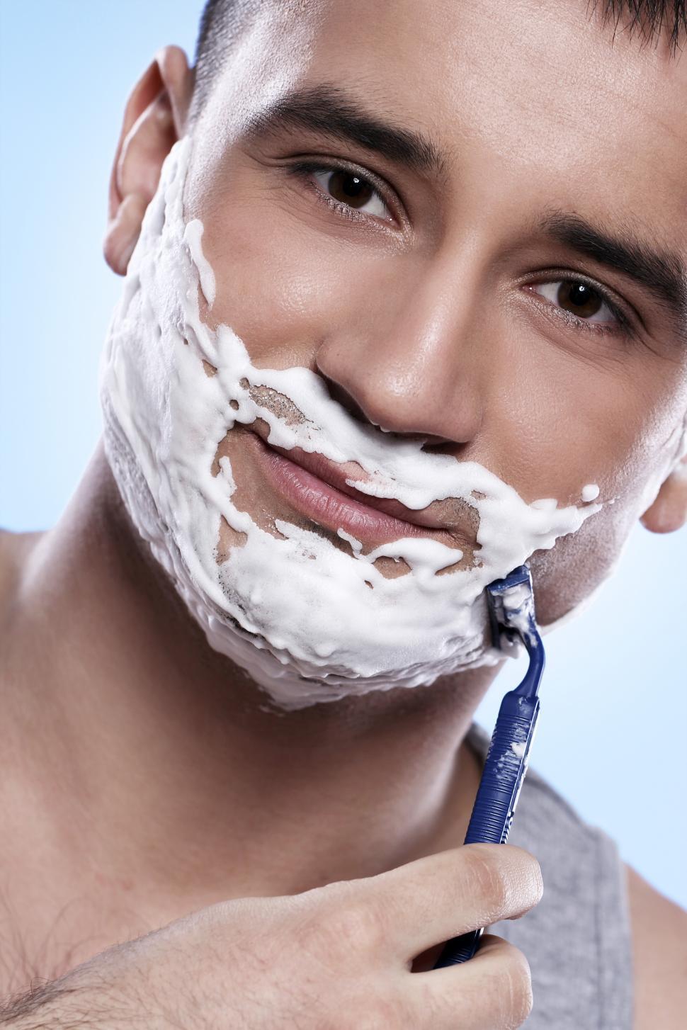 Free Image of Man shaving 