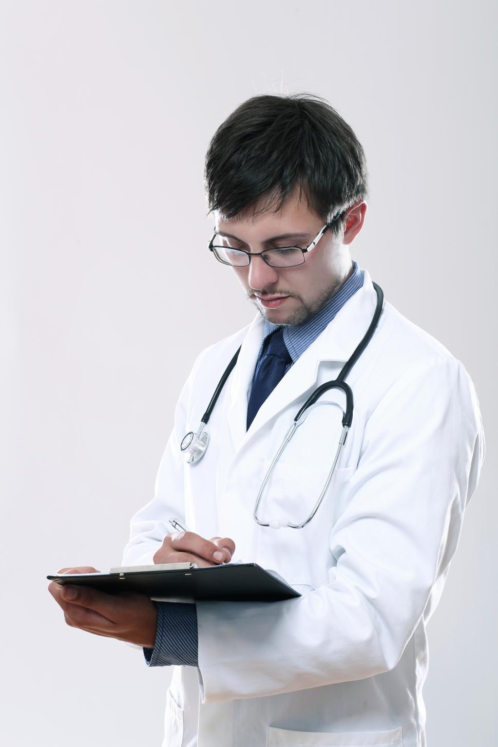 Free Image of Young doctor with stethoscope and clipboard 
