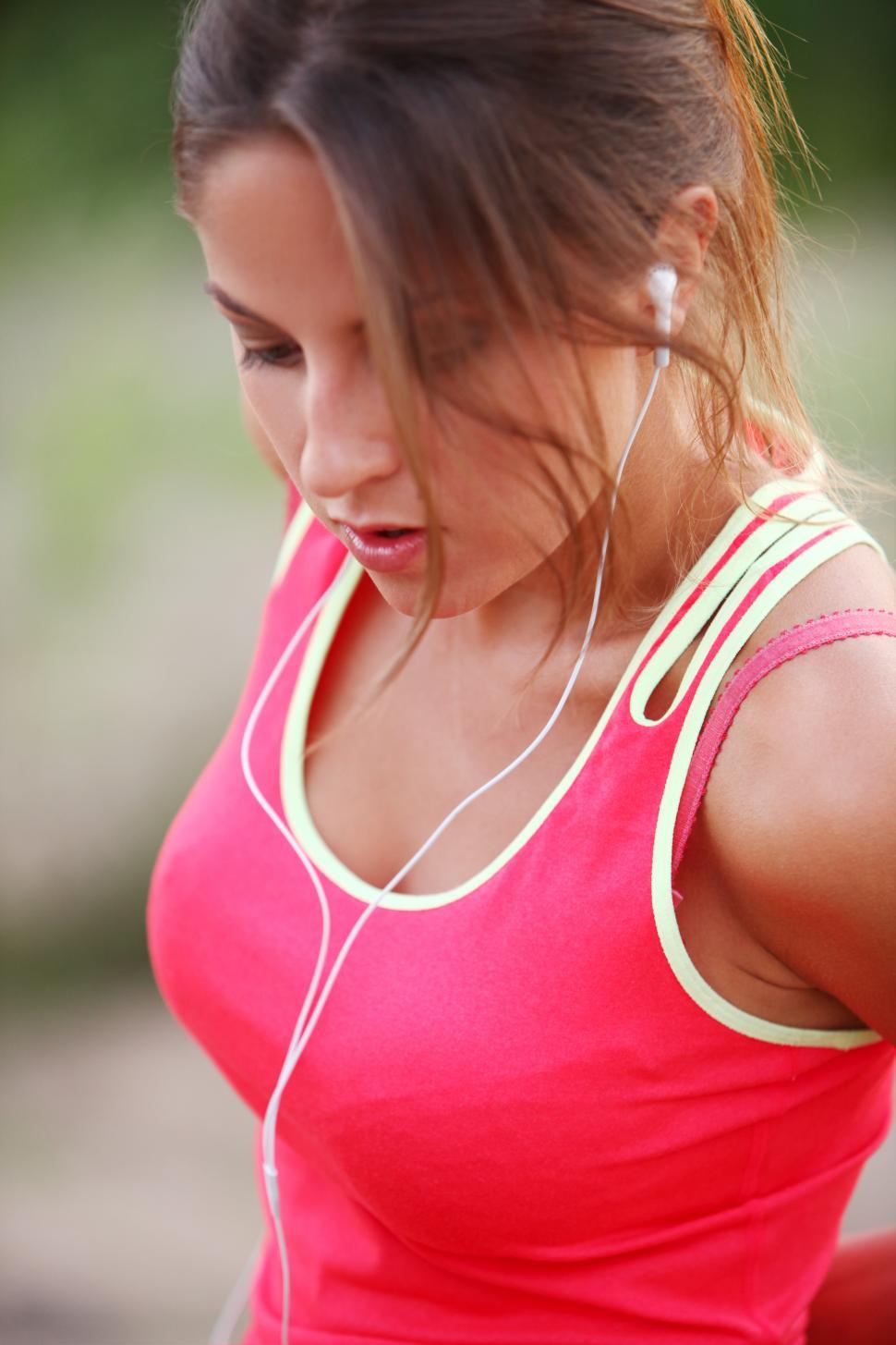 Download Free Stock Photo of Beautiful fitness girl with headphones 