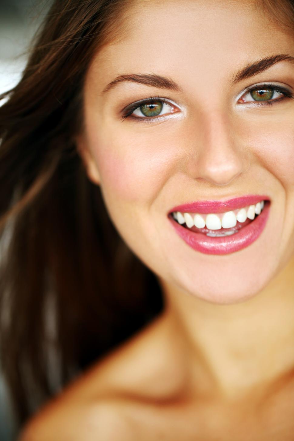 Download Free Stock Photo of Portrait of young smiling woman 