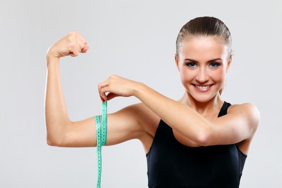 Download Free Stock Photo of Measuring biceps  