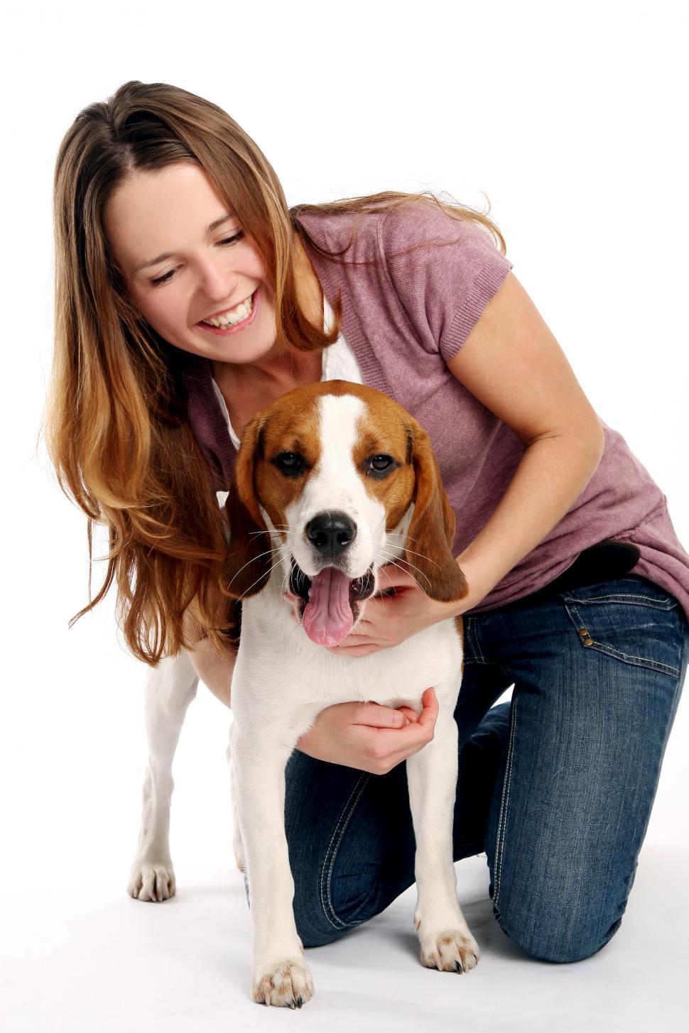 Free Image of beautiful young woman with cute dog 
