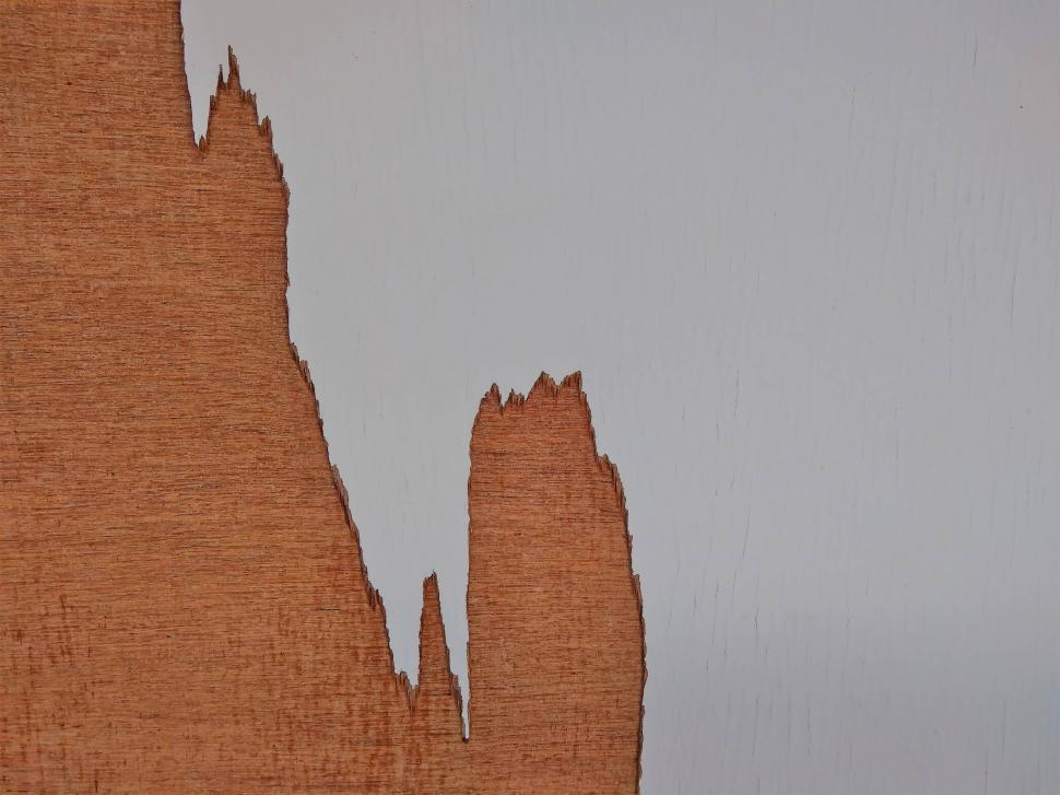 Free Image of Jagged Peeled Wood Background  
