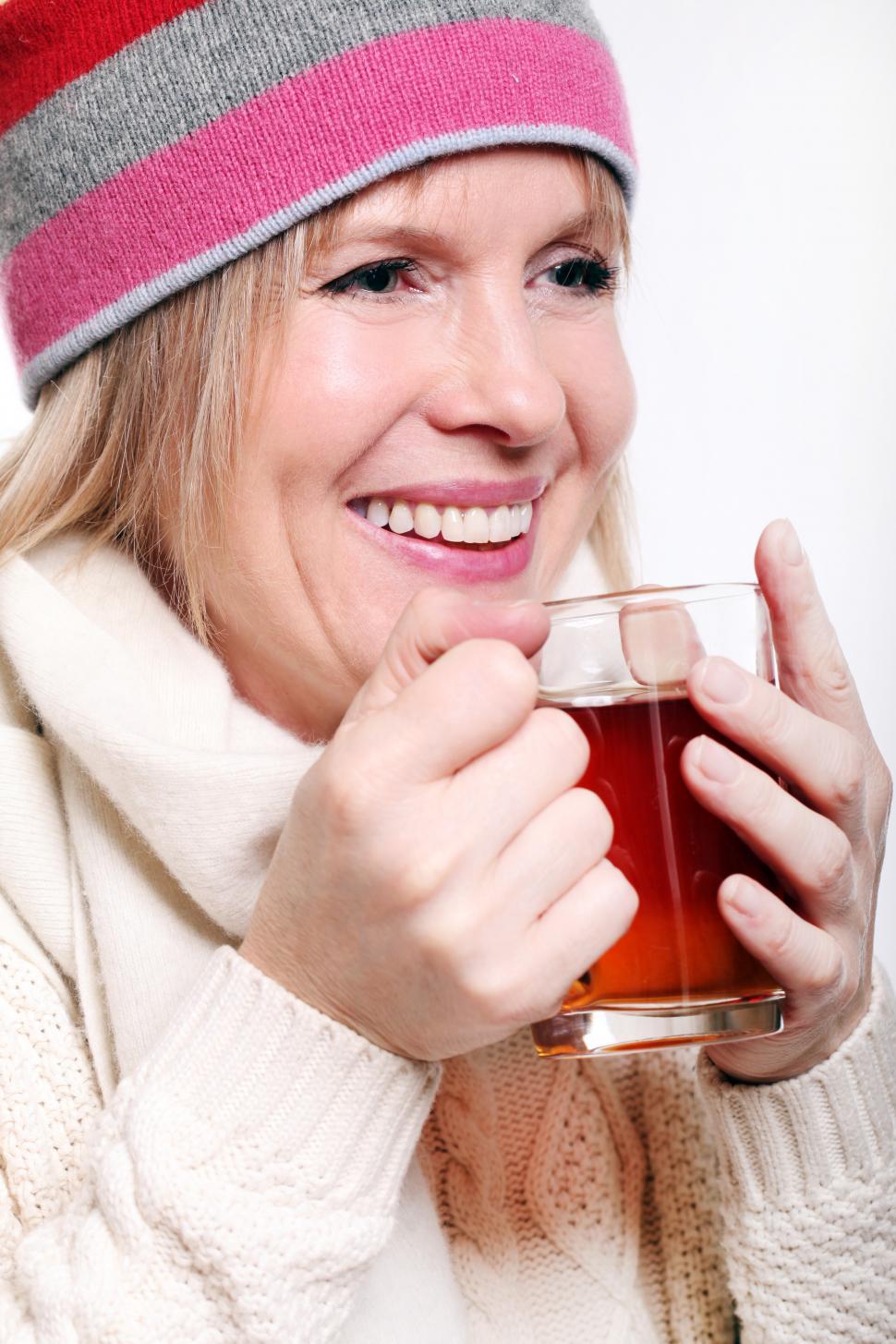 Free Image of Woman sipping hot beverage 