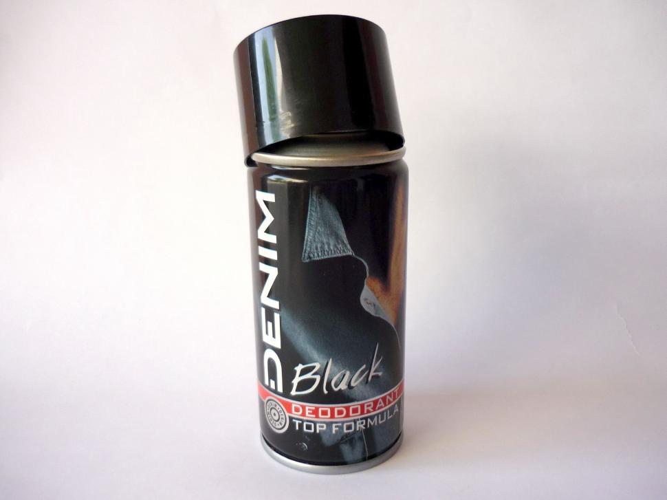 Free Image of Black Deodorant Can on White Background 