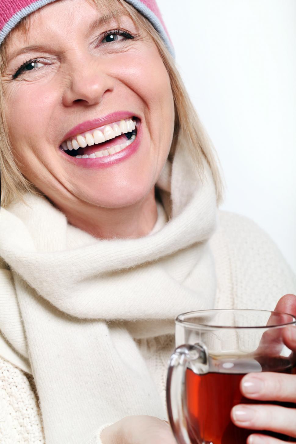 Free Image of Laughing woman with hot drink 