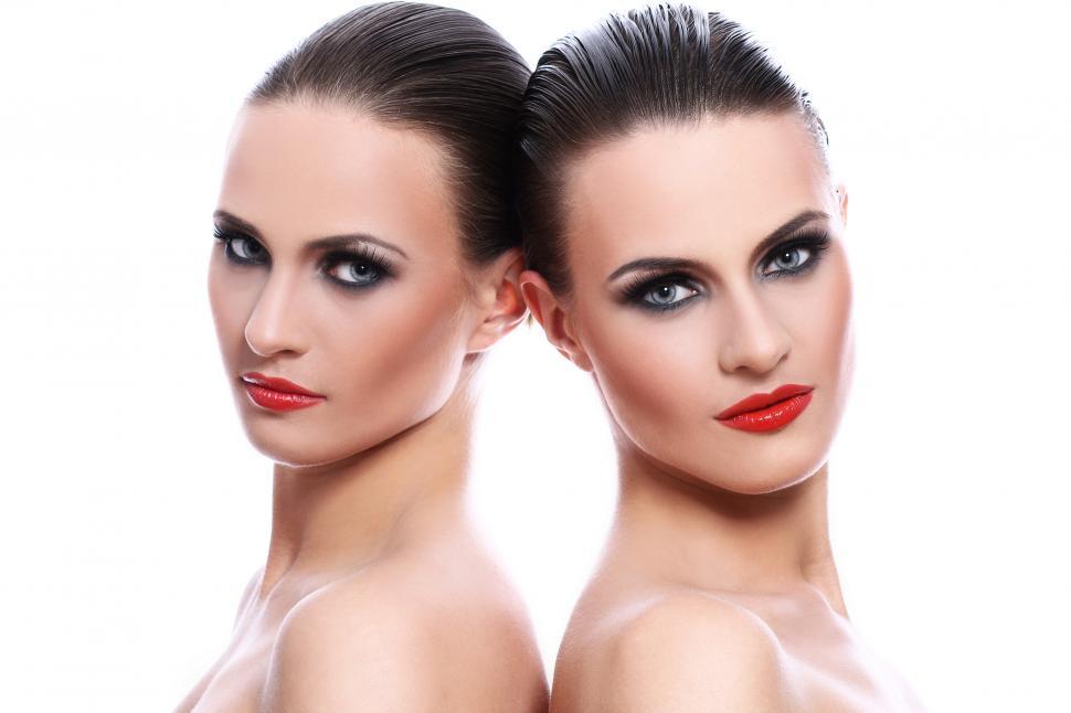 Free Image of Portrait of two women in dramatic makeup  