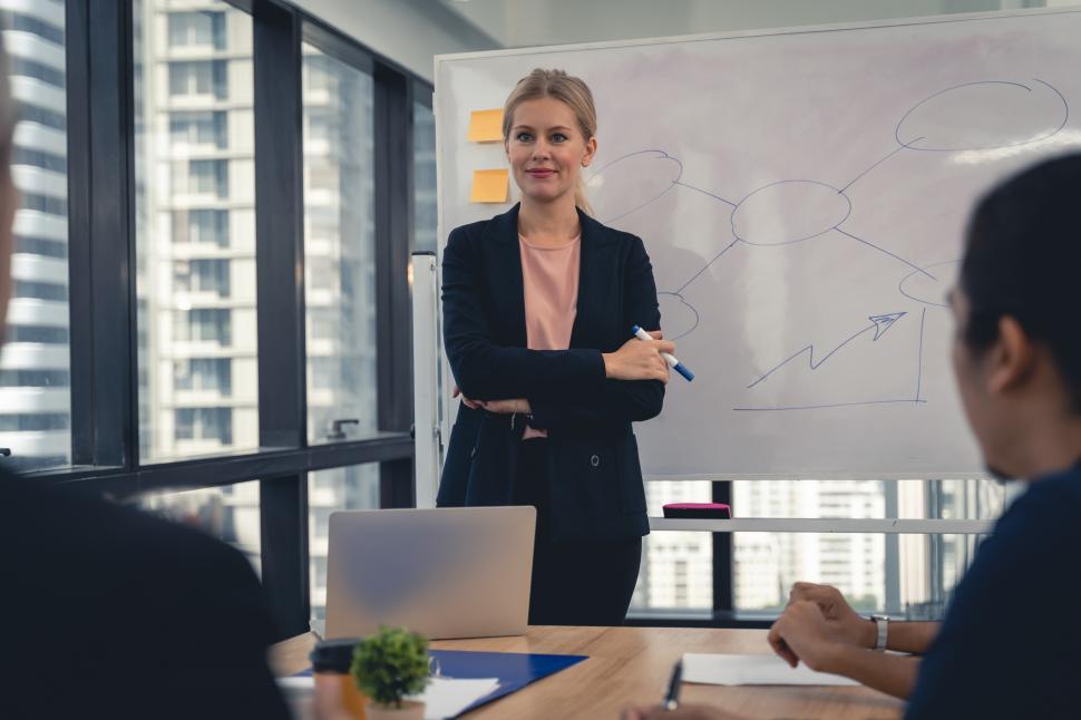 Free Image of A young businesswoman in meeting room working 