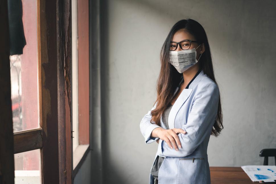 Free Image of COVID-19 Pandemic Coronavirus, Asian woman has a cold and symptoms 