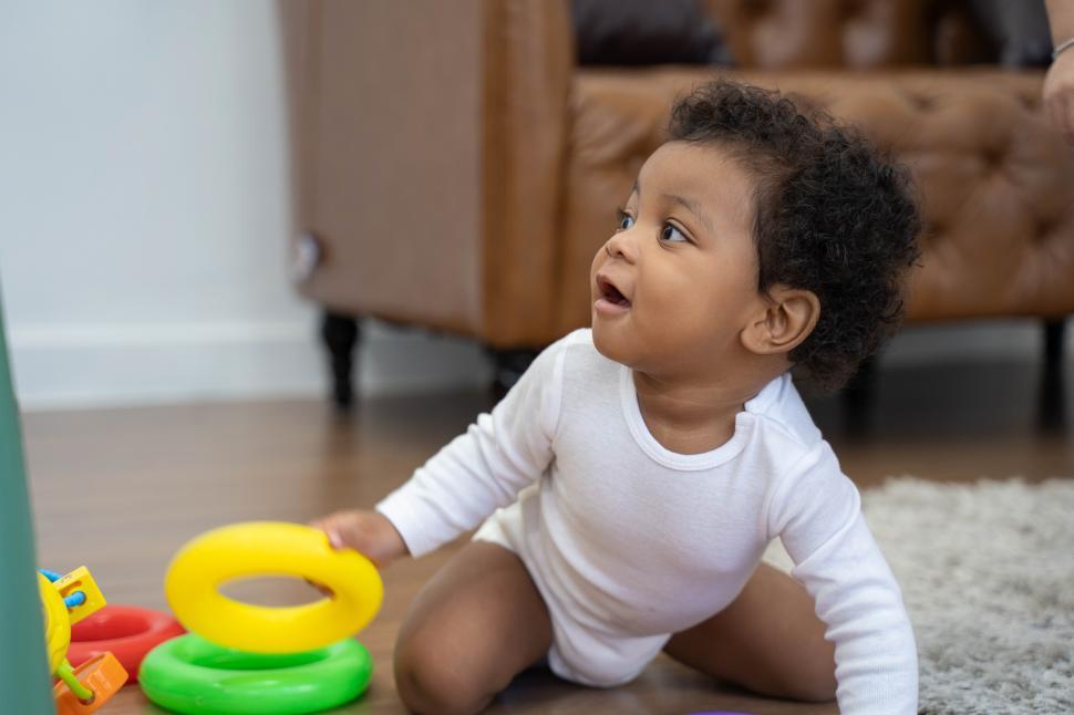 Free Image of Happy African American Little baby boy crawling 