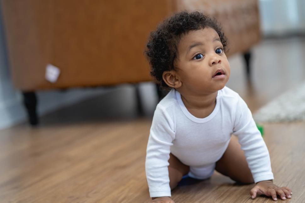 Download Free Stock Photo of Adorable baby boy crawling 