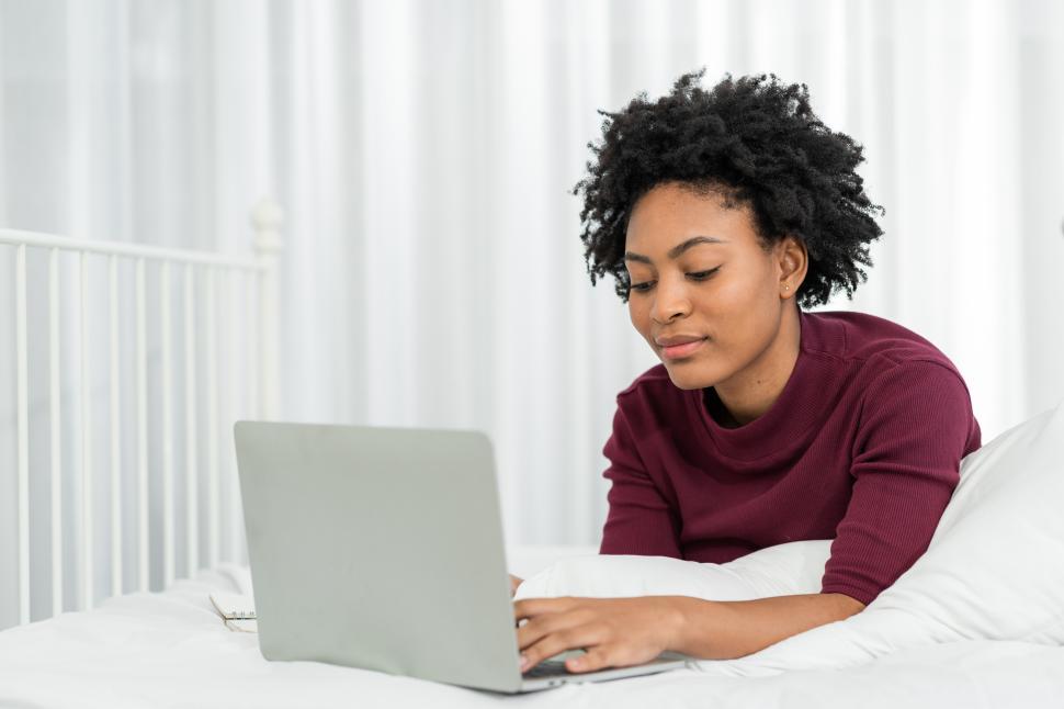 Free Image of Happy casual beautiful woman working on laptop 