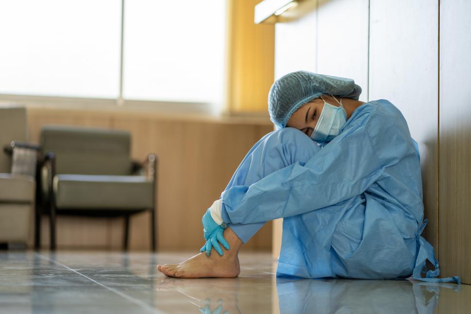 Free Image of Exhausted Hospital Worker 