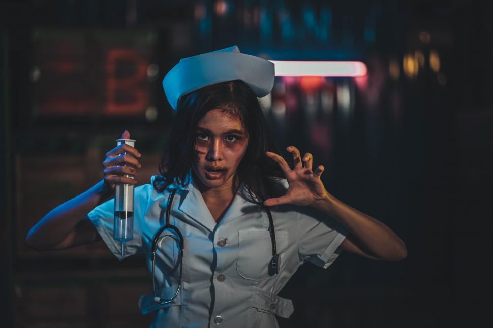 Free Image of Insane Nurse Halloween Costume 