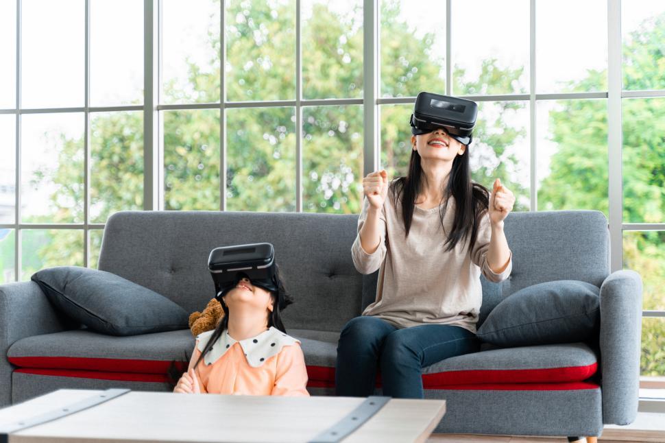 Free Image of Child and woman enjoying virtual reality headset 