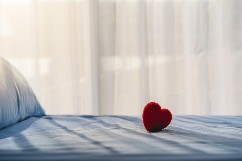 Free Image of Red heart on Patients bed 