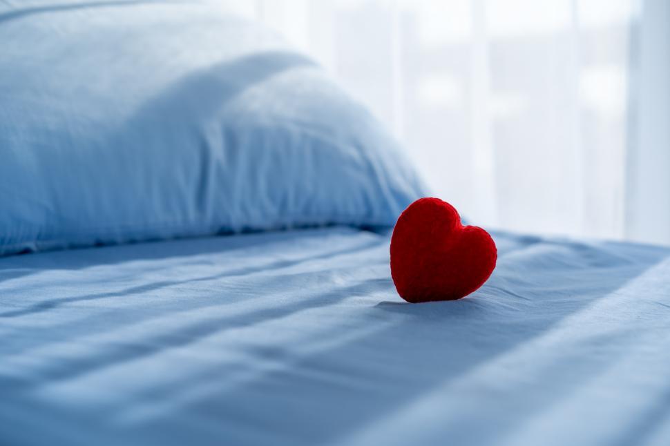 Free Image of Red heart on hospital bed 