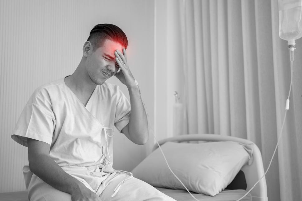 Free Image of Man is suffering from a headache 