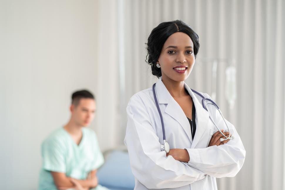 Free Image of African American doctor checking on patient 