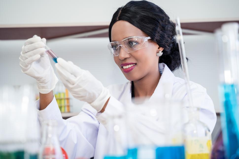 Free Image of Scientist holding a test tube 