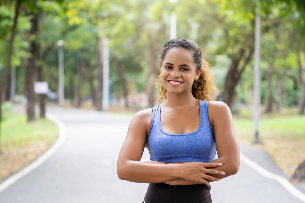 Free Image of Women standing with smile after exercise 