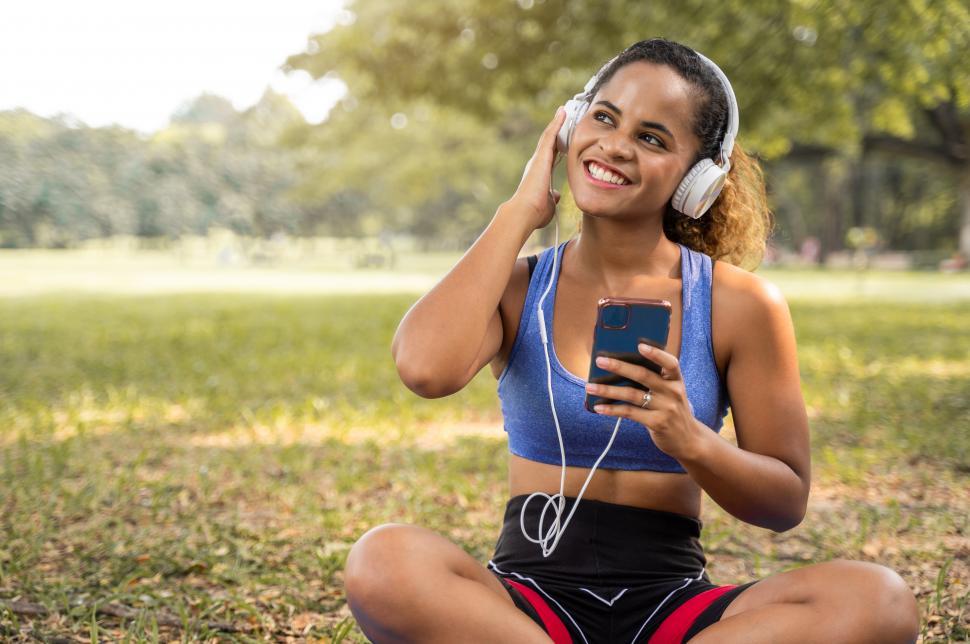 Free Image of Listening to music in the park 