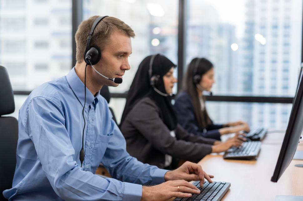 Free Image of Happy customer service agents at work 