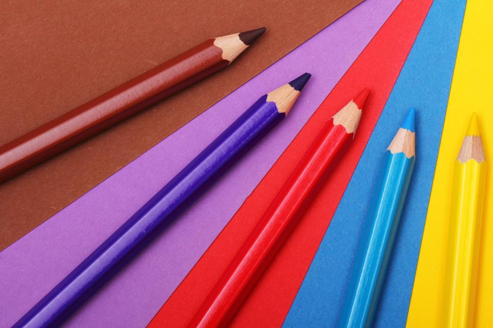 Free Image of Colored pencils on colorful paper 
