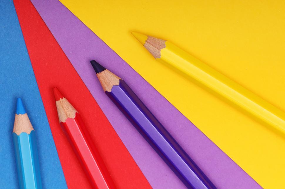 Free Image of Array of pencils on colorful paper 