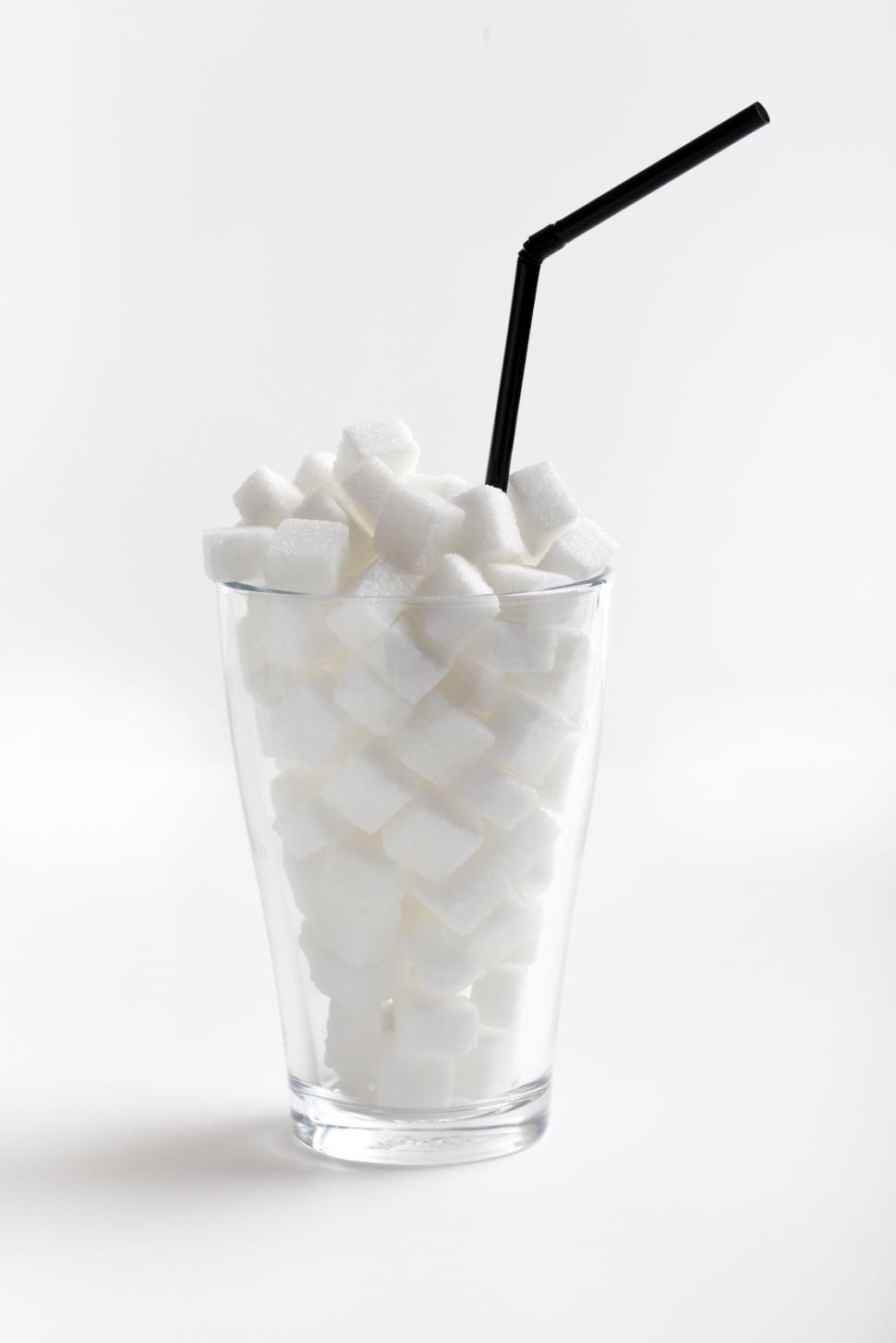 Free Image of Sugar cubes in a glass - sugared drink concept 