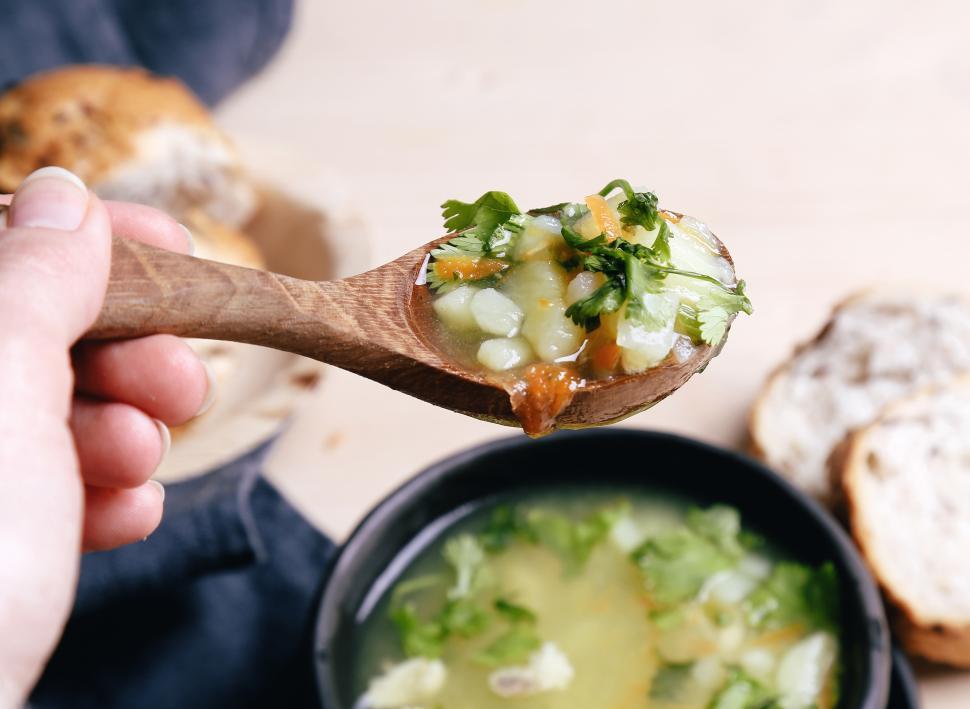 Free Image of Spoonful of delicious soup 