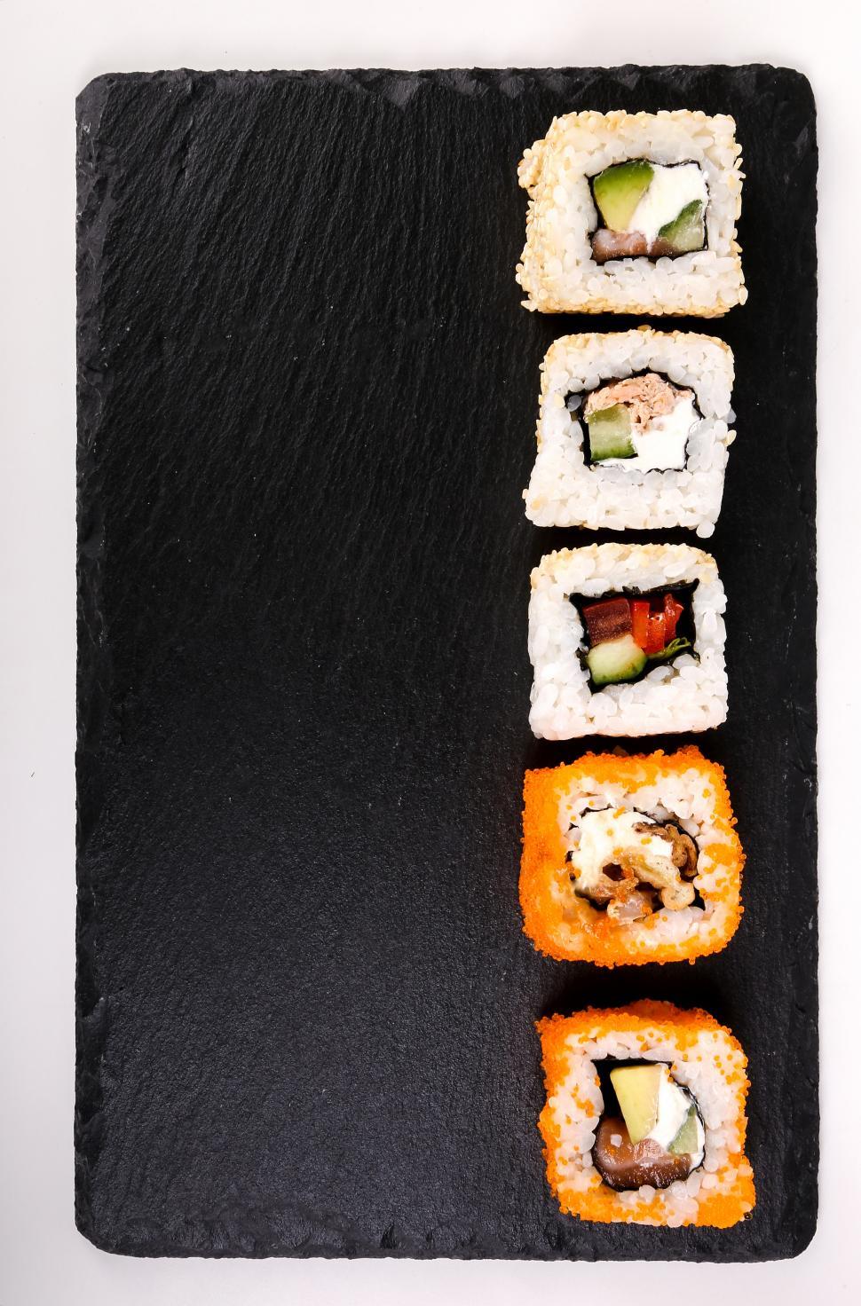 Free Image of Sushi rolls on a square plate 