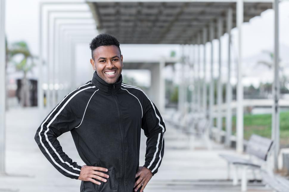 Download Free Stock Photo of Black personal trainer looking at camera 