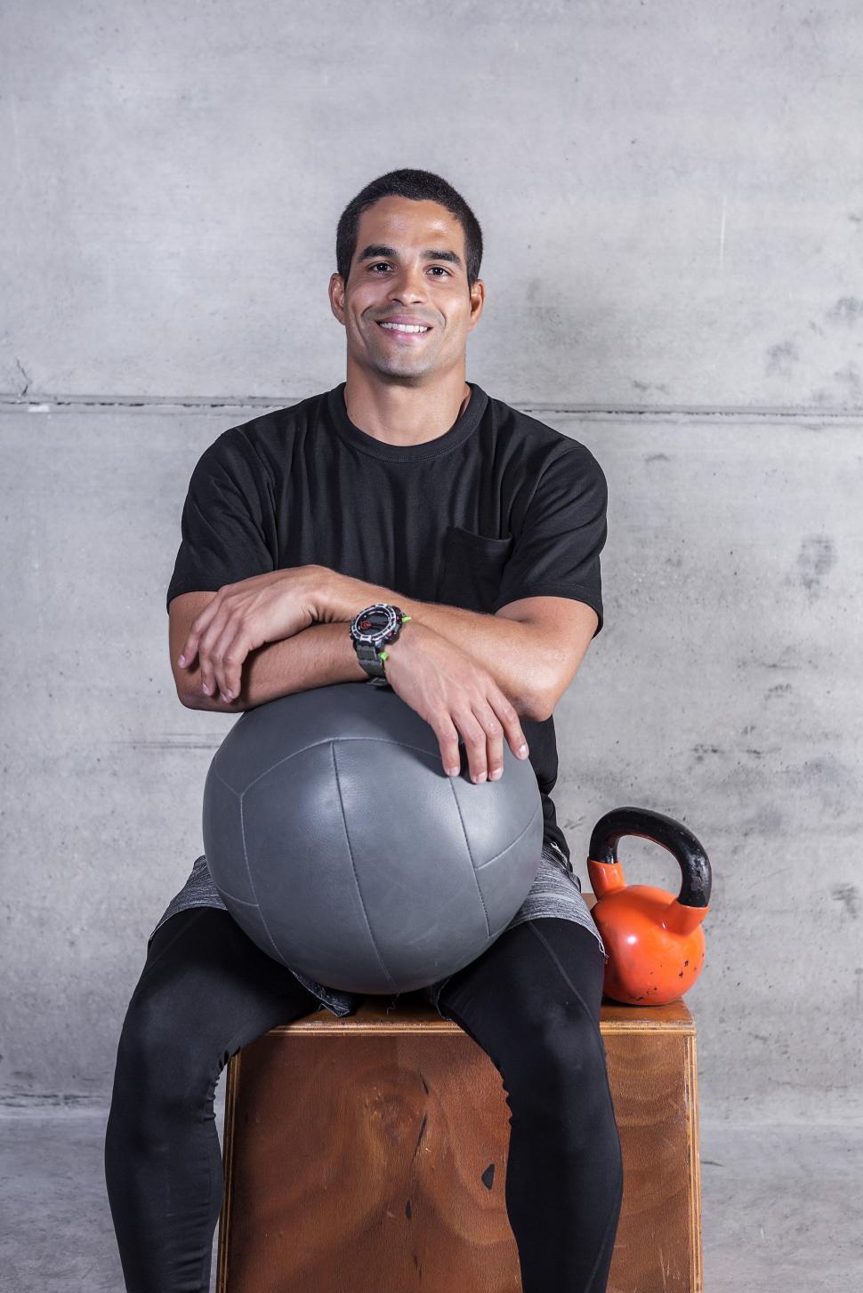 Free Image of Smiling athletic man with equipment 