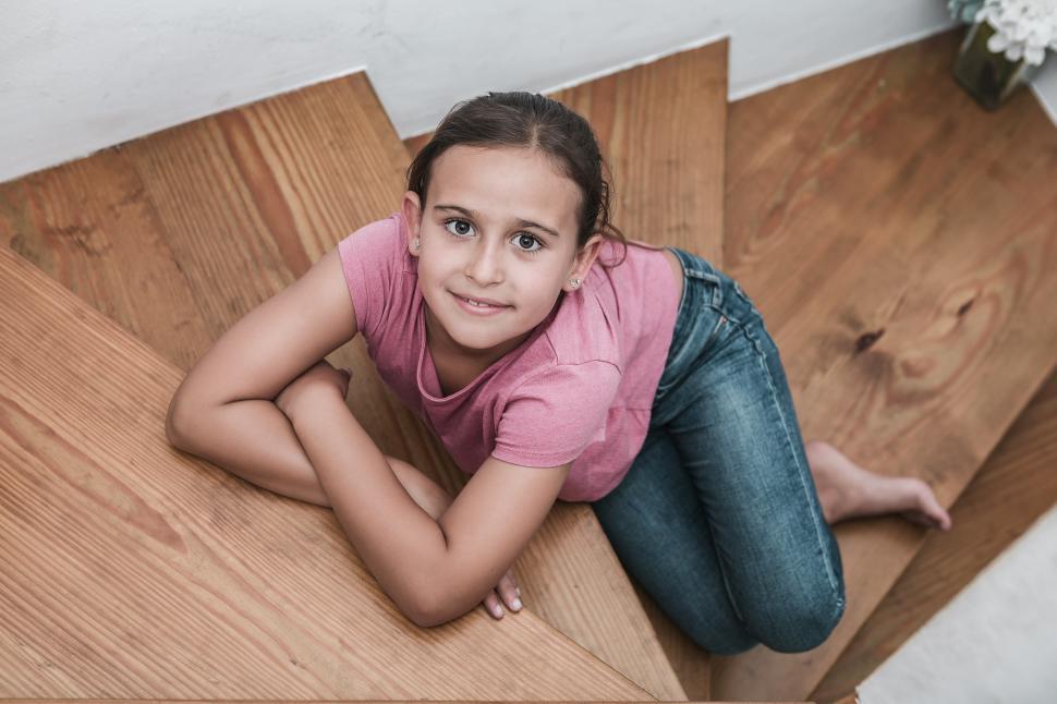 Download Free Stock Photo of Girl sitting on the stairs 