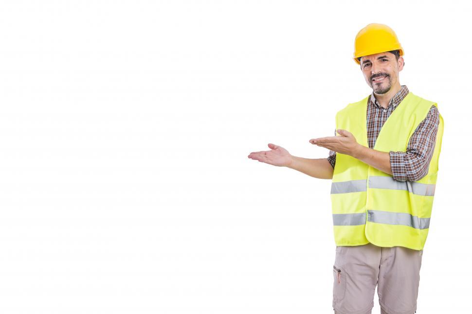 Free Image of Builder in hardhat and reflective vest on white background 