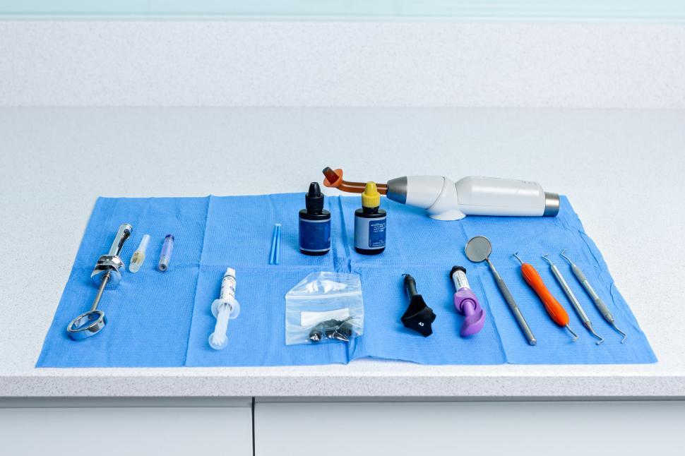 Free Image of Table with a sterile tablecloth with tools for a dentist 