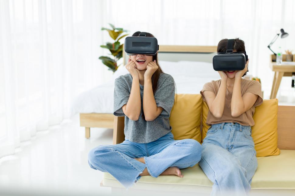 Free Image of Women wearing VR headsets. 