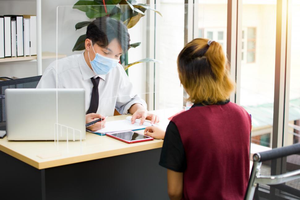 Free Image of Male employees worked in offices during disease outbreak 