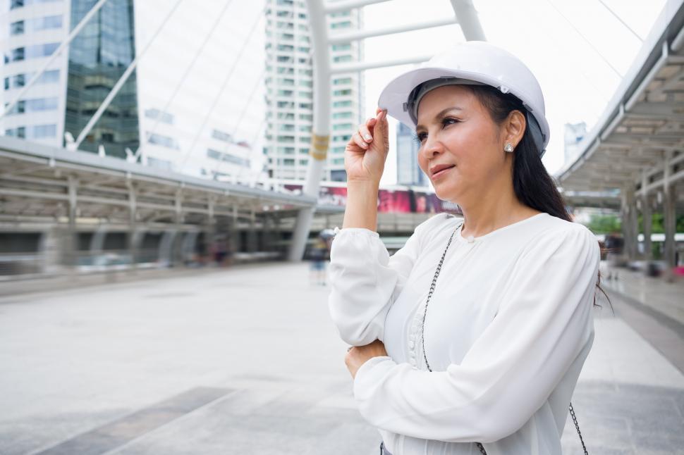 Free Image of Woman surveying construction site 
