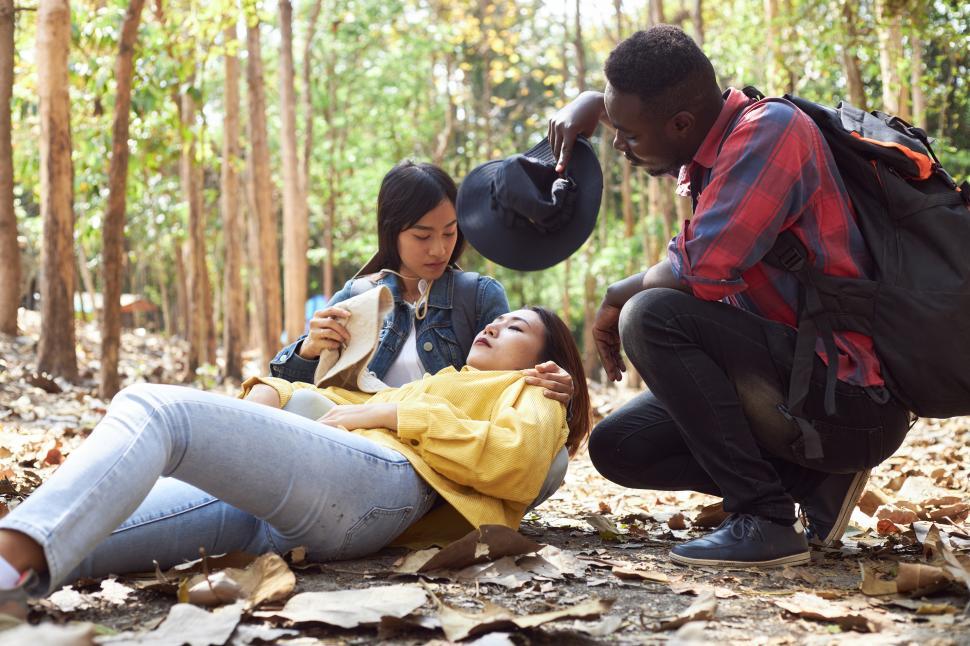 Free Image of The tourist fainted in the forest. 