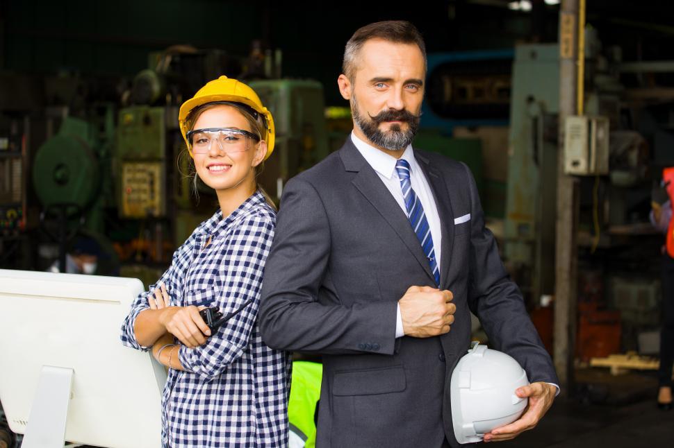 Free Image of Portrait of a businessman and female engineer 