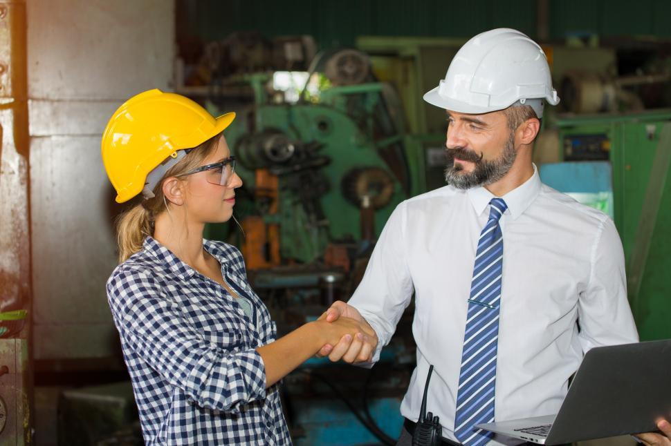 Free Image of Engineer or technician is working in the factory with business guy 