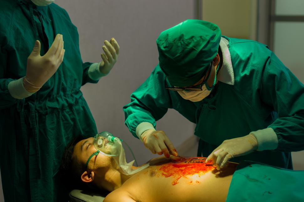 Download Free Stock Photo of Surgeons perform simulated surgery 