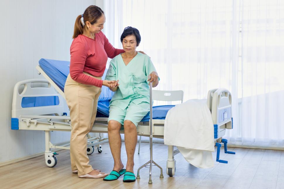 Free Image of Daughter takes care of an aged mother. 