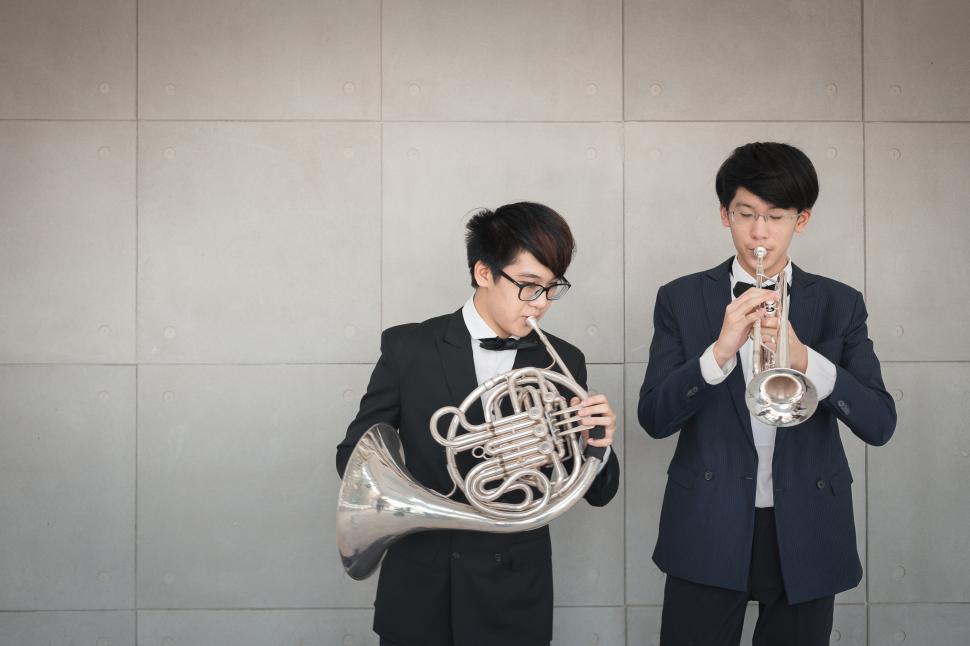 Free Image of Young musicians playing the trumpet and French Horn 